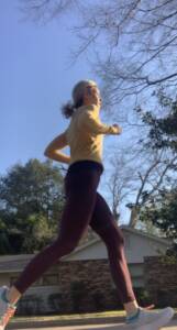 Whitney running in hoka bondi shoes