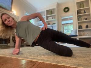 Whitney Heins doing a side plank