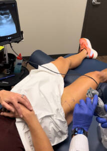 Whitney Heins getting PRP injection into hip