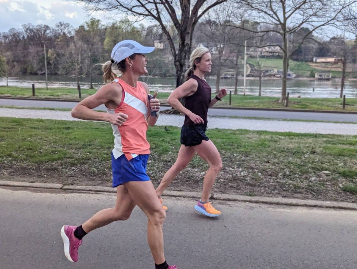 Whitney Heins running with a friend