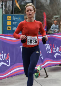 Whitney Heins running a race