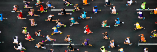 looking at runners in a marathon from an overhead view